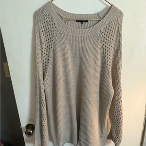 Elegant Beige Sweater with Textured Sleeves